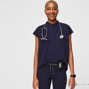 NWOT. Rafelea top in navy. Never worn.